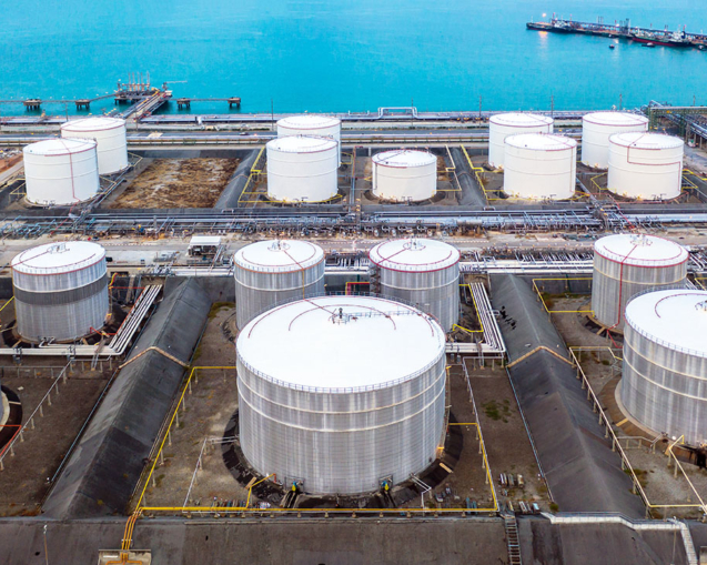 Oil and petrochemical tank, storage of oil and petrochemical products ready for logistic and transport business. Aerial view.
